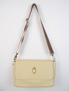 beige bag with gold scarab detail