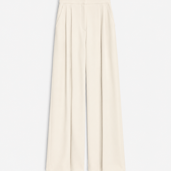 A pair of high-waisted, wide-leg trousers in a warm cream or off-white color, shown flat against a clean white background.