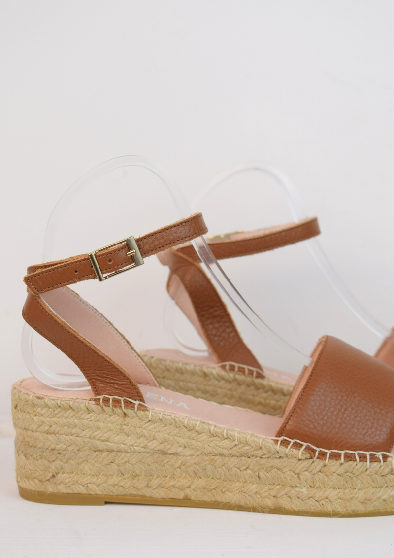 Raffia flatform sandel with tan leather toe and ankle strap 