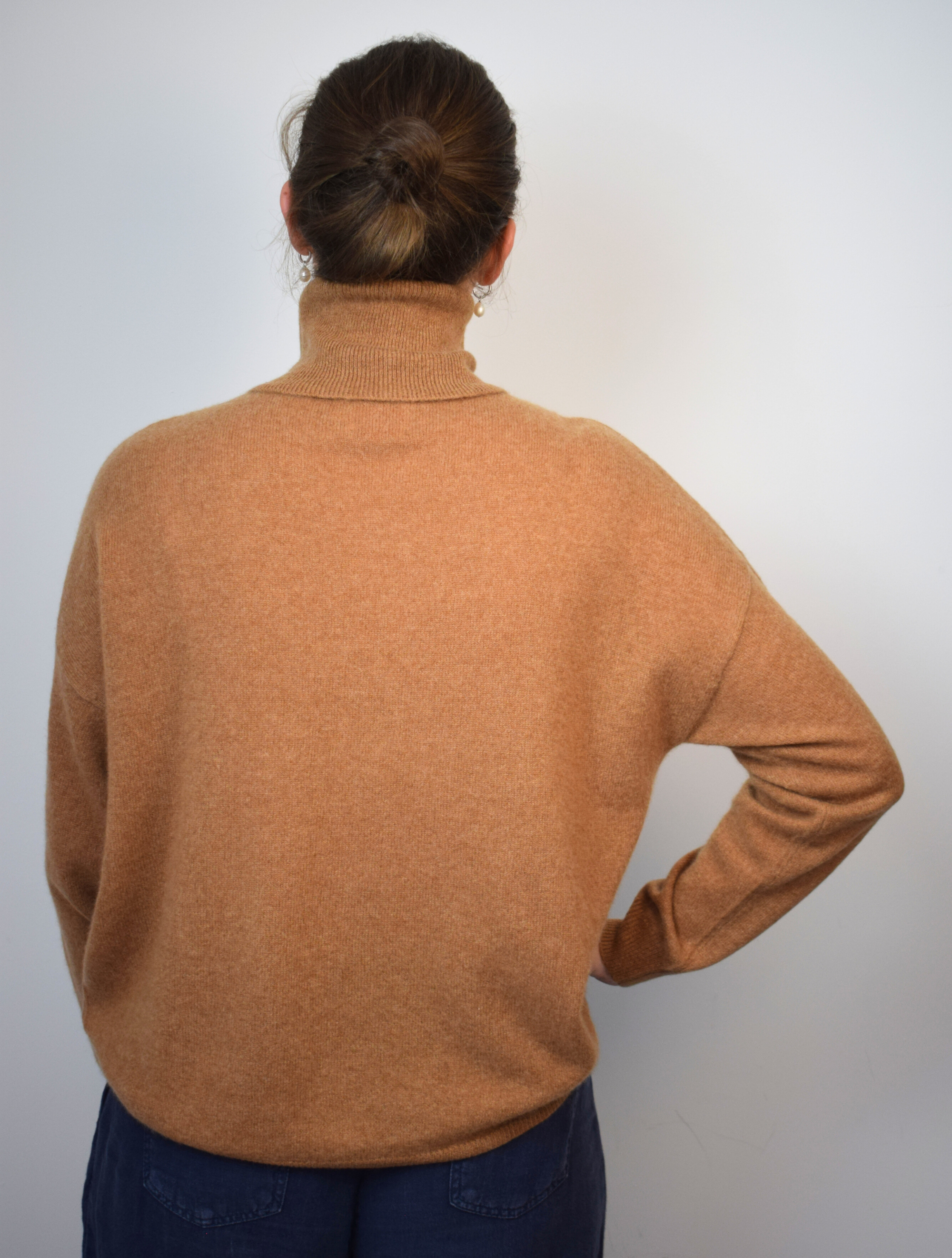 Tan brown roll neck cashmere jumper with dropped shoulders