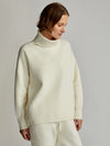 Roll neck supersoft knitted top in cream with tie drawstring waist