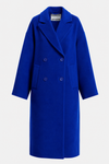A vibrant royal blue double-breasted coat with notch lapels and dark buttons, shown on a light gray background. The brand label 'ANTWICKER' is visible inside the collar.