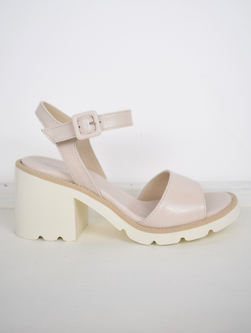 nude sandals with a white block heel 