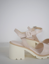 nude sandals with a white block heel 