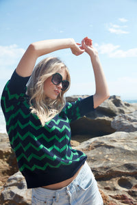 Navy and green chevron short sleeved top with crew neckline