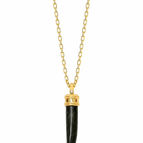 A gold chain necklace featuring a pendant shaped like a dark green polished animal claw or fang, capped with a gold collar, shown against a plain white background.
