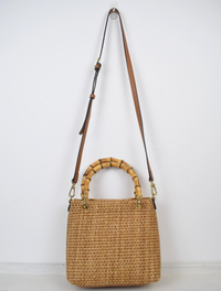 raffia bag with bamboo handle and longer nude cross body strap