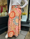 Pink tiedye skirt Patterned maxi skirt in tones of pink and turquoise with a shaped hem detail