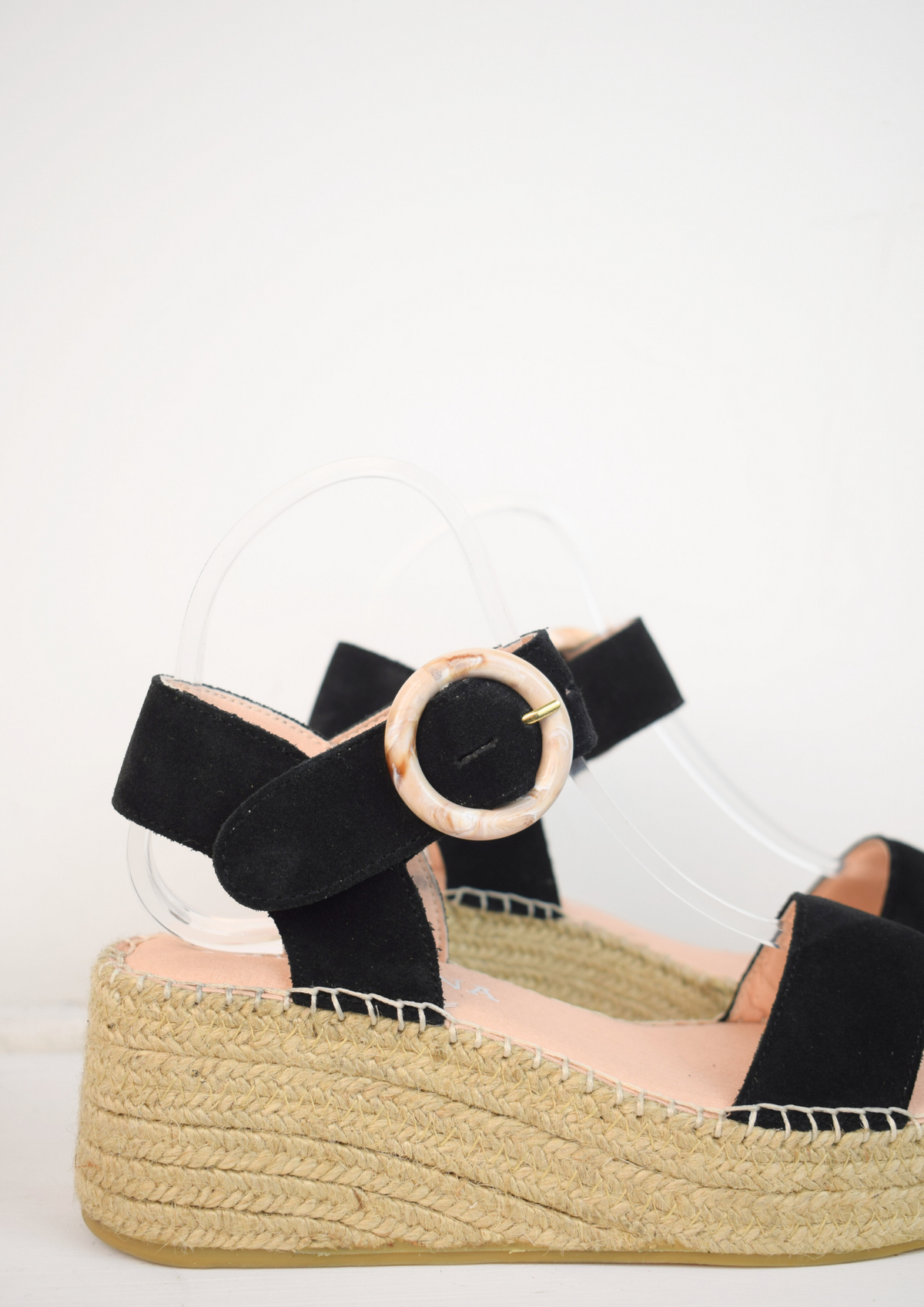 Black flatform sandals with buckles on the ankle strap 