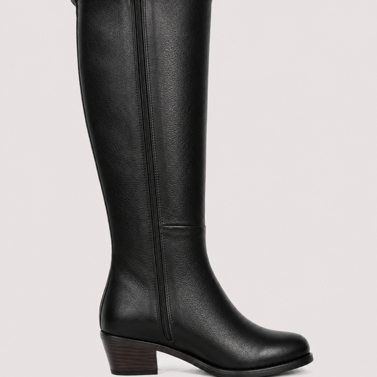 A single black leather knee-high boot with a low block heel and side zipper, shown in profile against a light gray background.