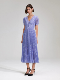 Lilac and white polka-dot V neck midi dress with pleated details throughout and short sleeves
