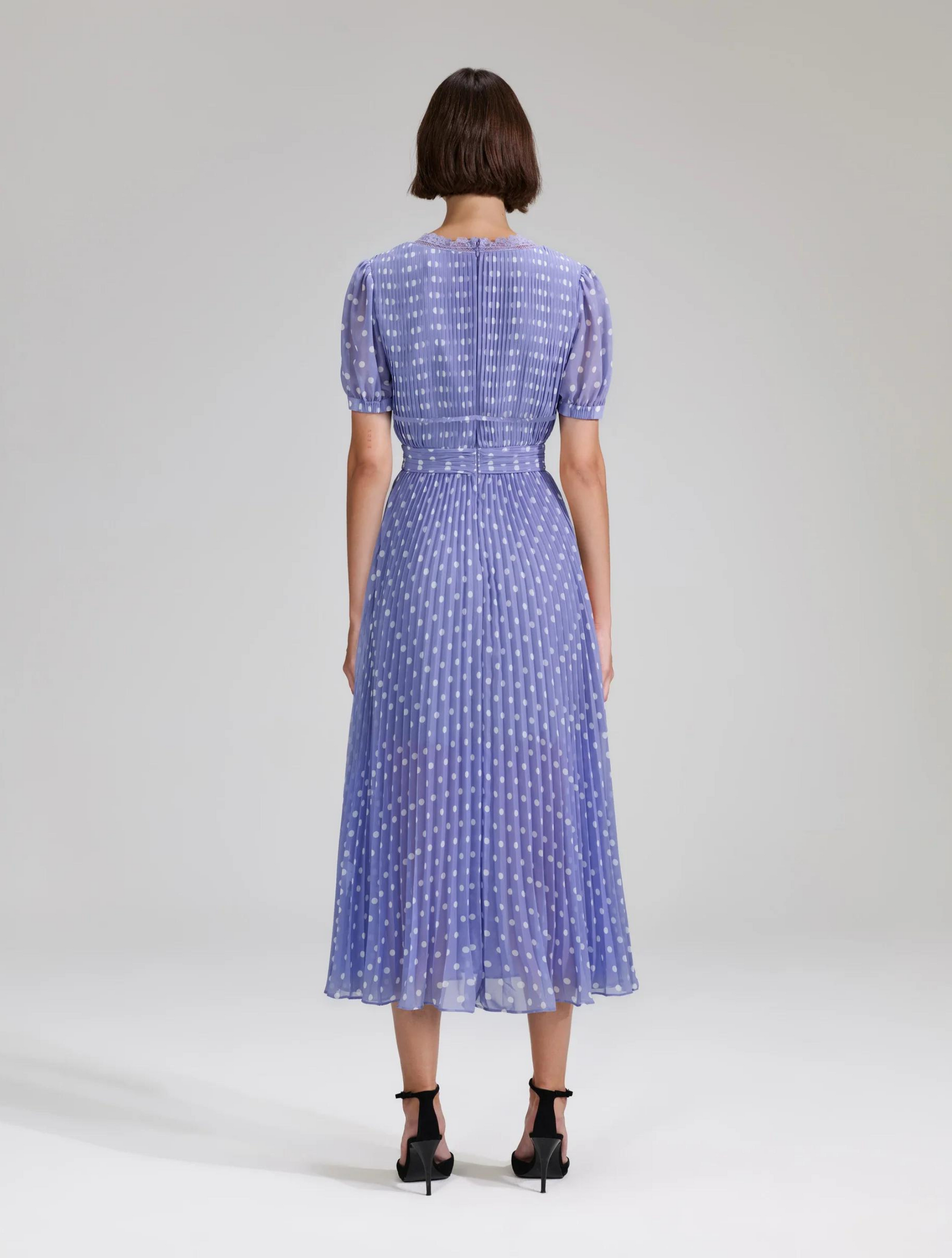 Lilac and white polka-dot V neck midi dress with pleated details throughout and short sleeves