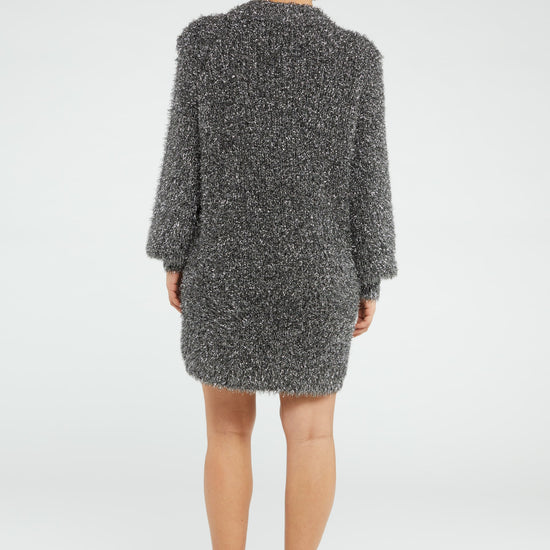 Chunky knit silver tinsel style short dress with crew neckline and long full sleeves with ribbed cuffs