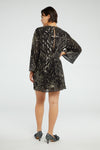 Black mini dress with long wide sleeves and gold sequin details throughout