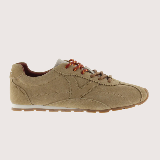 Brown suede shoe on a white background