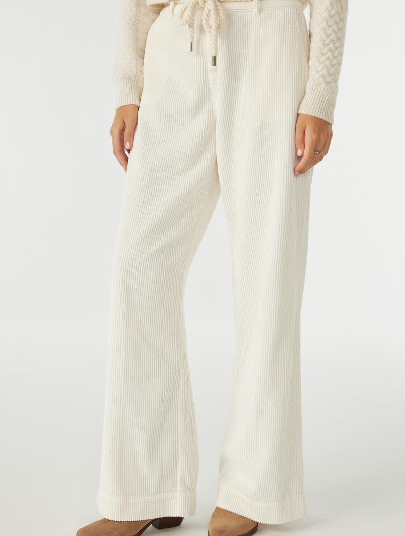 White cord trousers with tie belt 