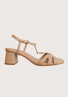 Beige sandal with a block heel on a light beige background