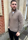 male model wearing brown cashmere quarter zip jumper.