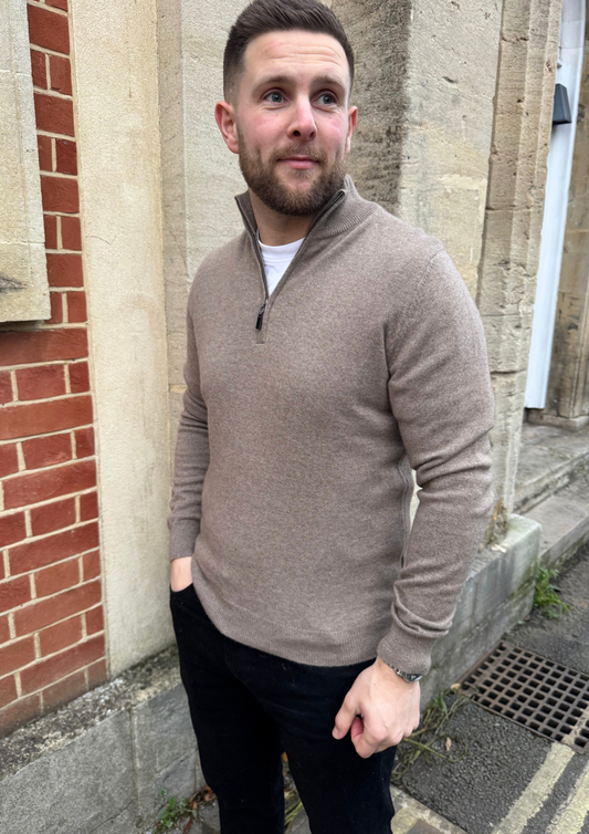 male model wearing brown cashmere quarter zip jumper.