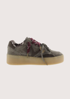 A low-top platform sneaker in dark gray suede and leather, featuring a thick beige gum sole, gray laces, and burgundy ribbon laces tied in a bow.