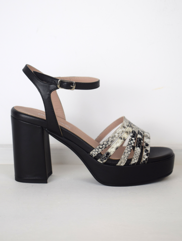 Black platform heel with snake skin straps 