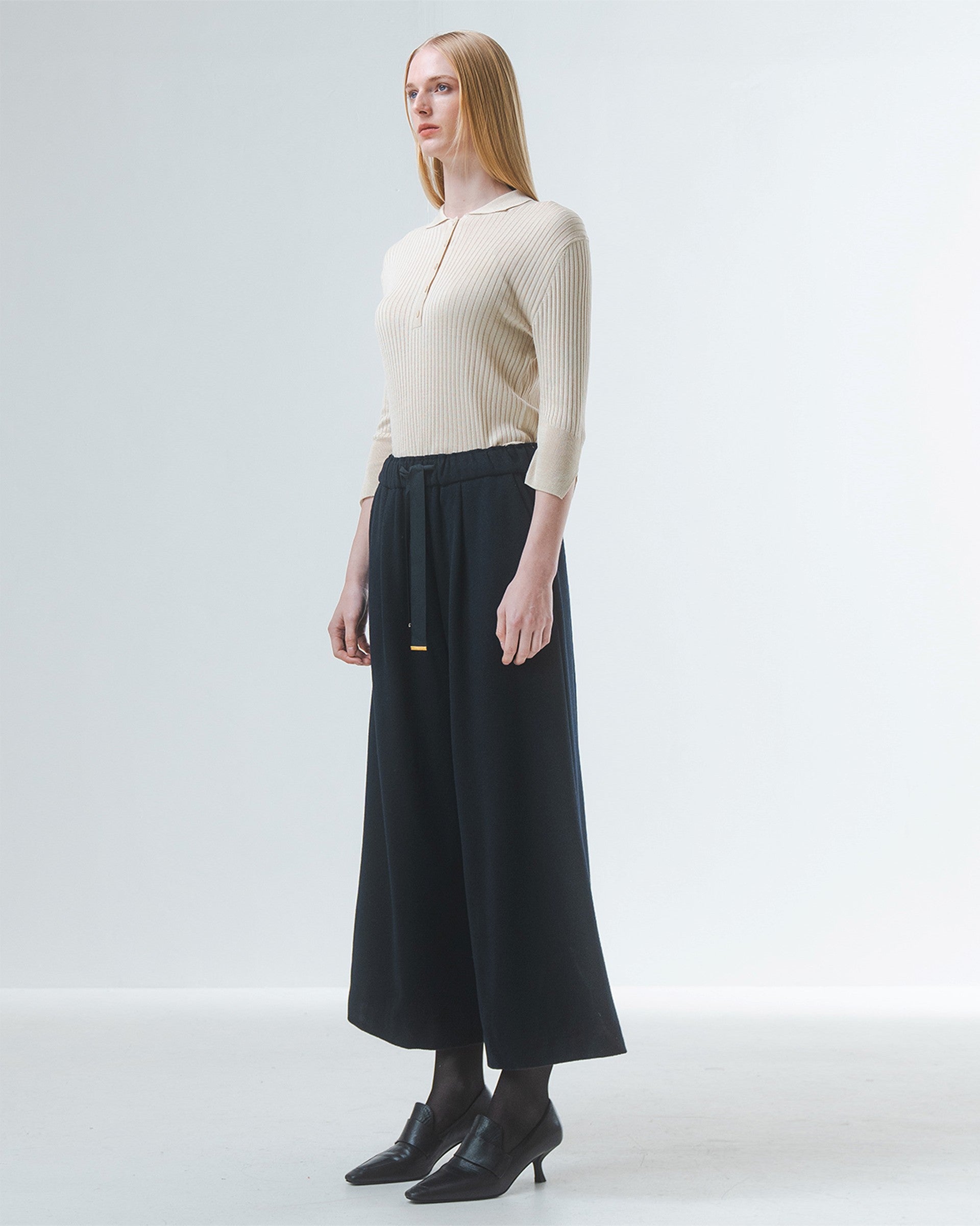 wide leg black culottes with drawstring waist and tie from emin and paul side view