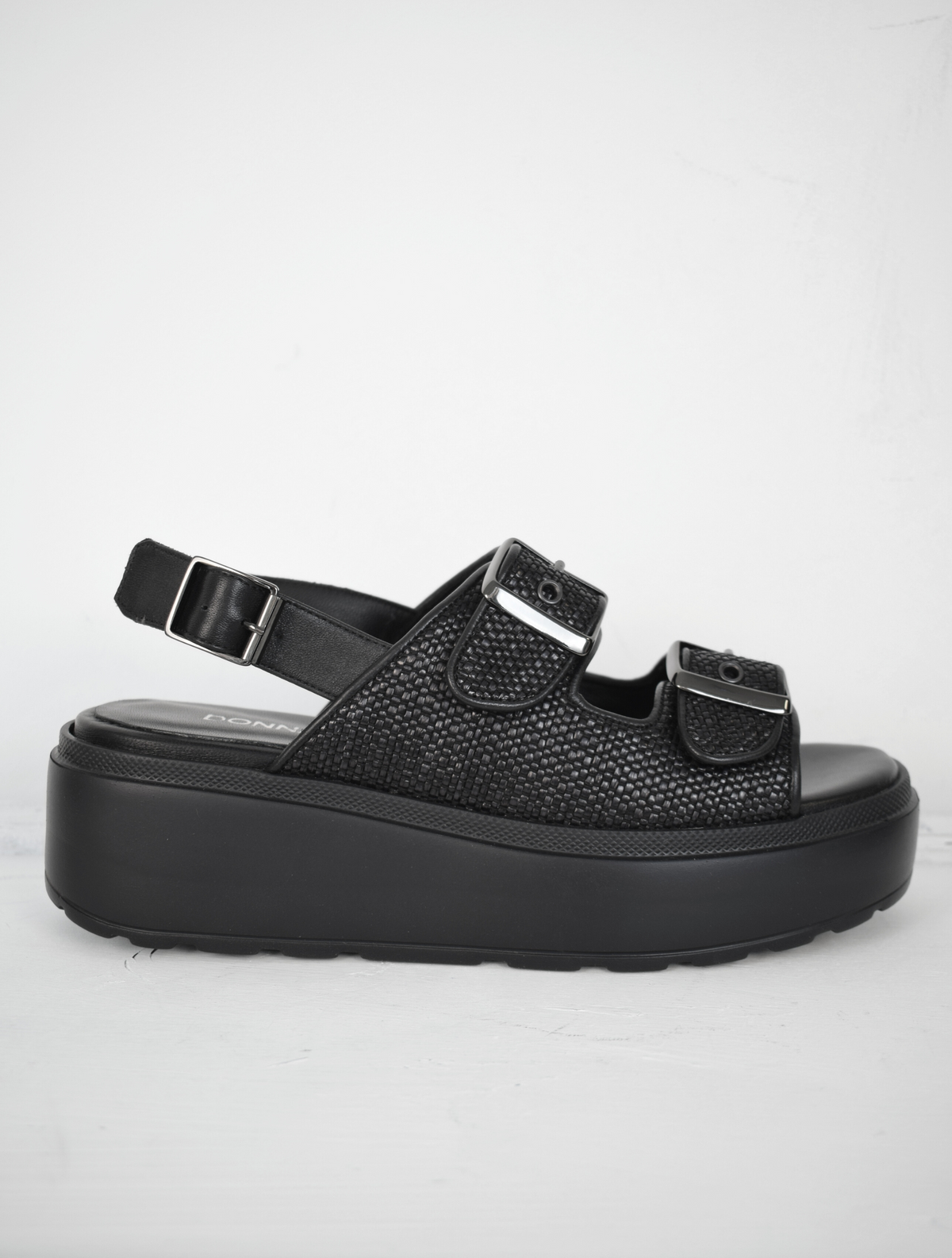 black raffia sandals with strap across back 