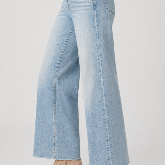 blue jeans on model on plain background