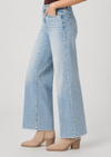 blue jeans on model on plain background