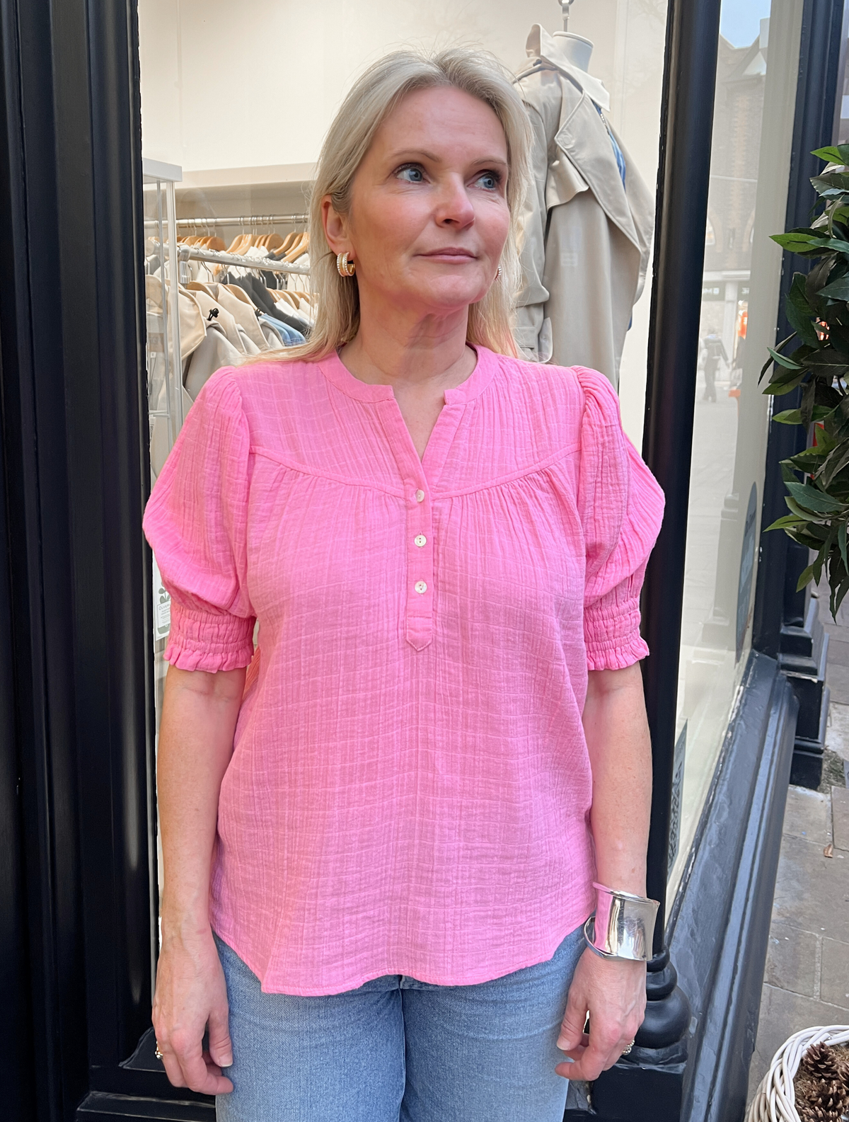 100% cotton shirt, made in a cheese cloth fabric that is cool, light and breezy. Cut in a candy pink,