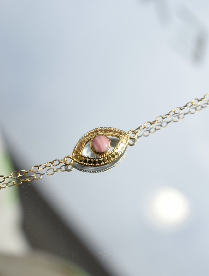 Gold evil eye bracelet with pink opal stone 