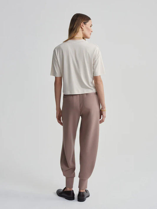 Rear view of oatmeal tee on model