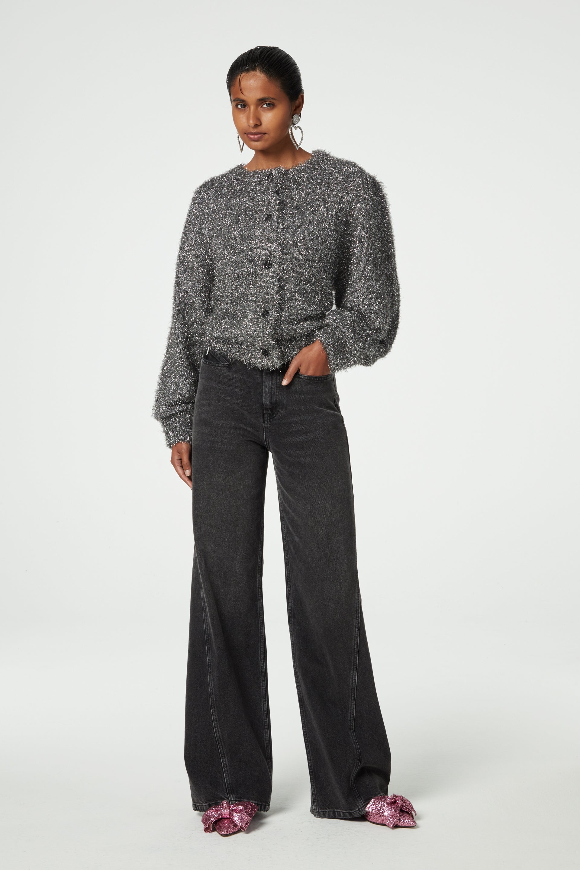 Silver tinsel effect knitted cardigan with wide sleeves crew neck and black button fastening