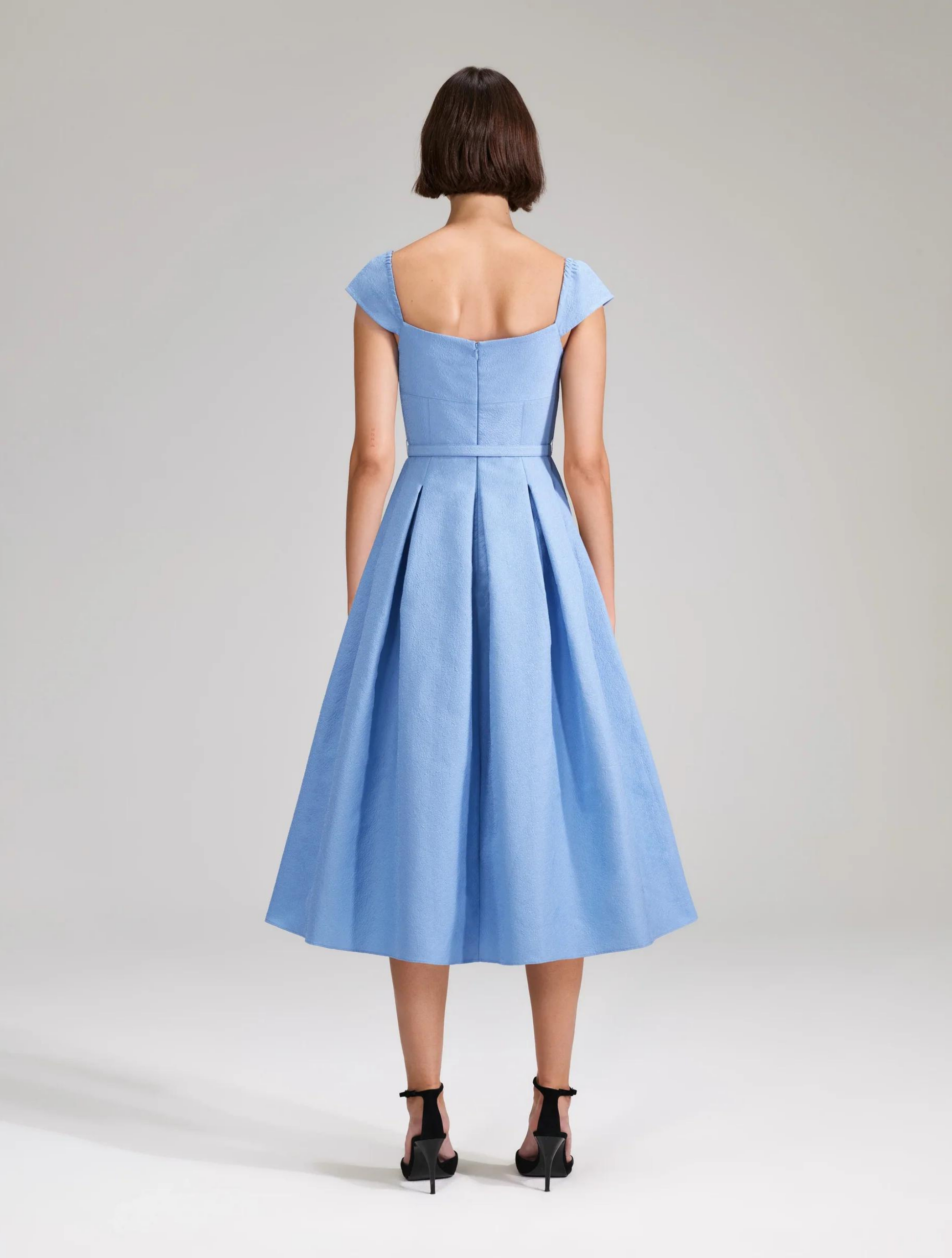 Pale blue A line dress with sweetheart neckline small sleeves and fitted bodice