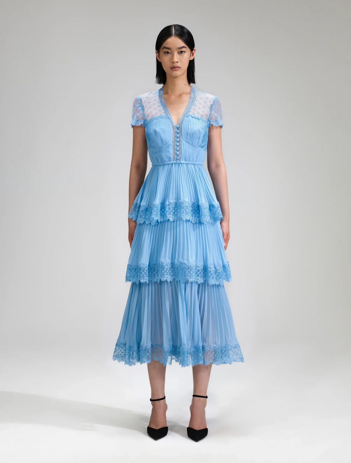 Light blue pleated chiffon lace trimmed midi dress with V neckline and lace shoulders