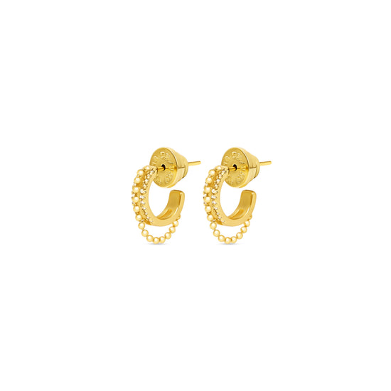 gold huggie earrings with cubic zirconia detailing and longer ball chain section side view