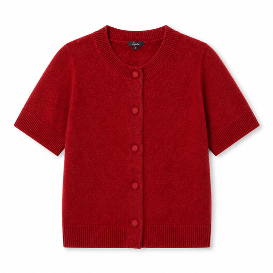 A red short-sleeve knit cardigan with a button-up front, ribbed collar, hem, and cuffs, displayed flat against a white background.