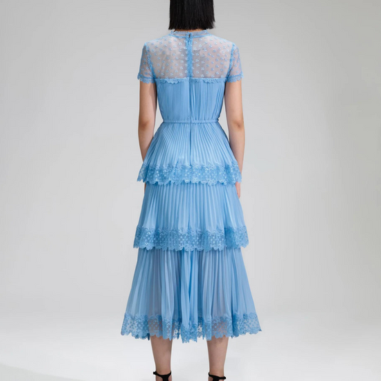 Light blue pleated chiffon lace trimmed midi dress with V neckline and lace shoulders