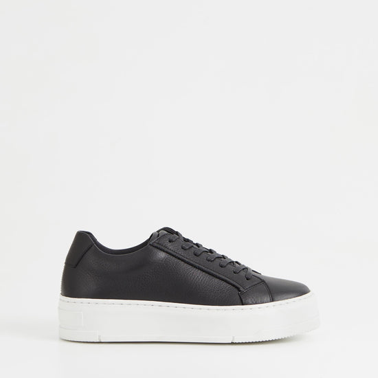 Black leather trainers with white chunky platform sole and heel