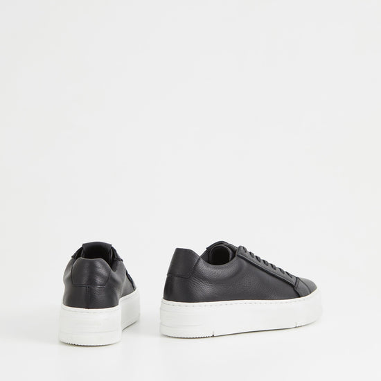 Black leather trainers with white chunky platform sole and heel