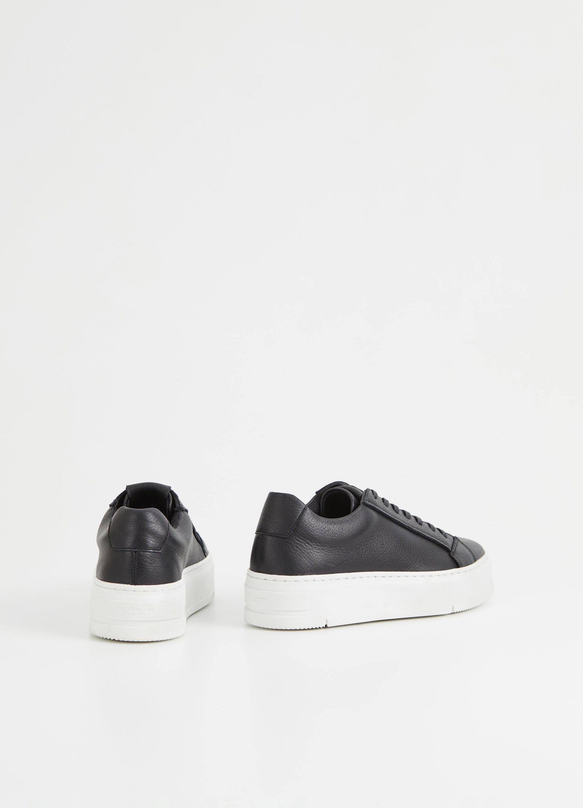 Black leather trainers with white chunky platform sole and heel