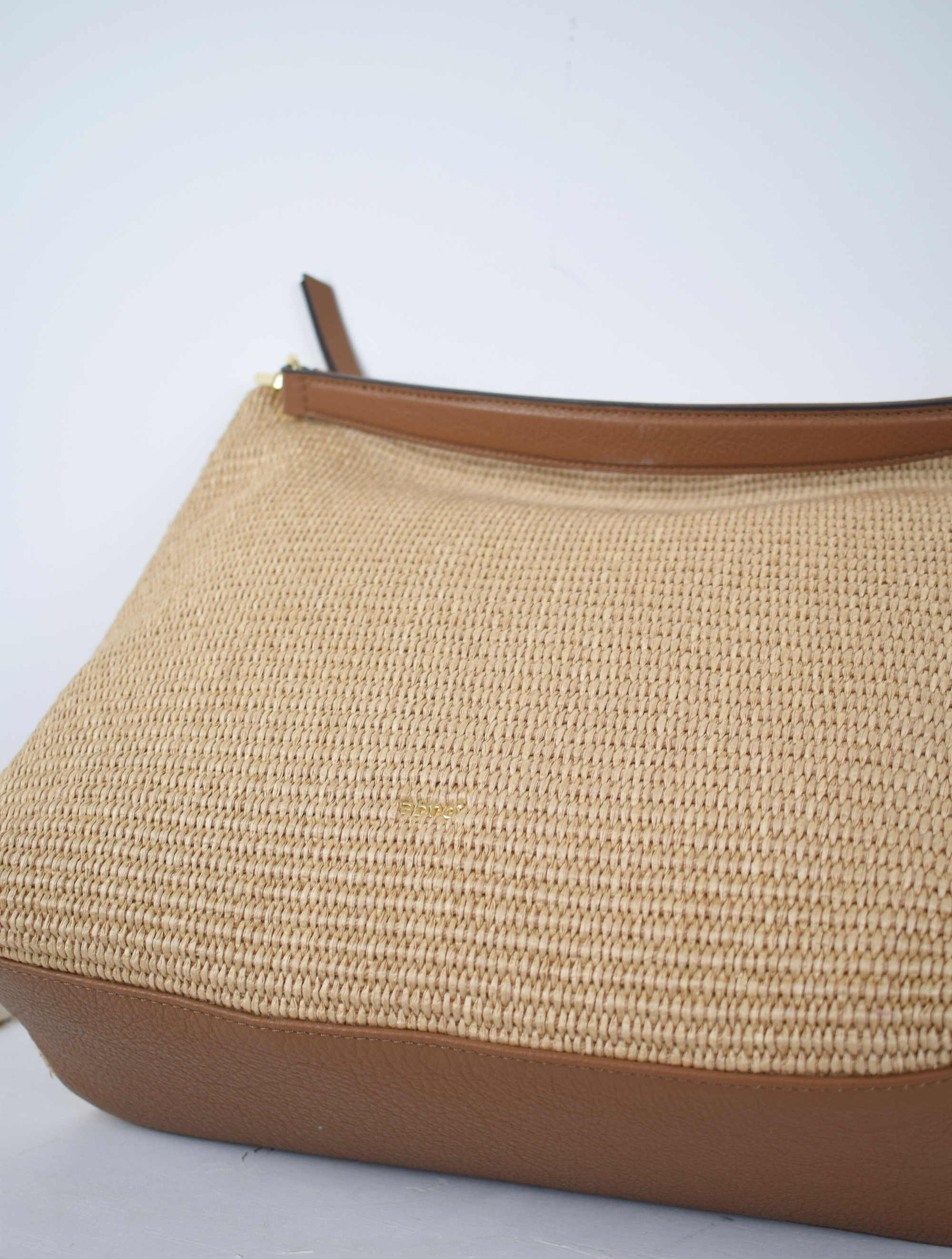Raffia bag with brown leather strap 