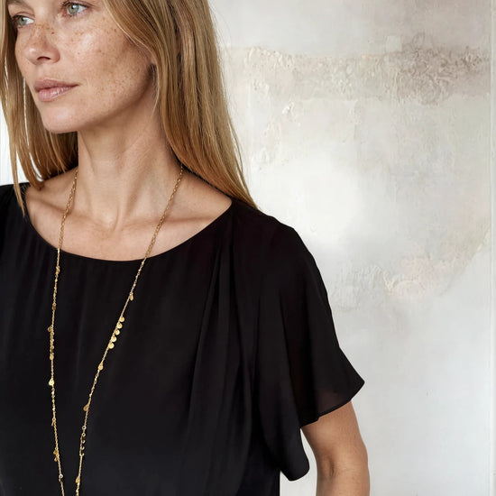 Black flutter sleeve top from Sirens