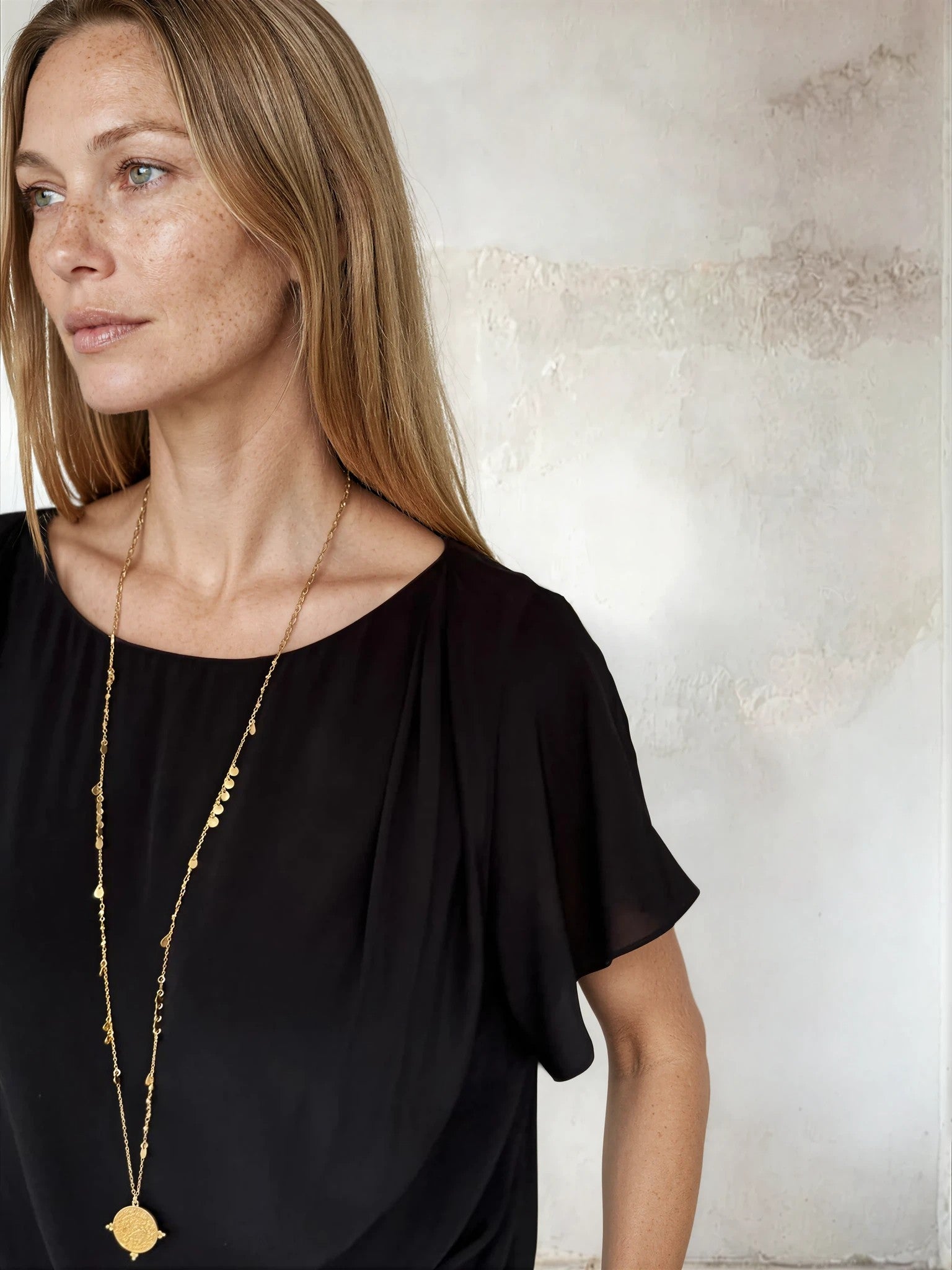 Black flutter sleeve top from Sirens