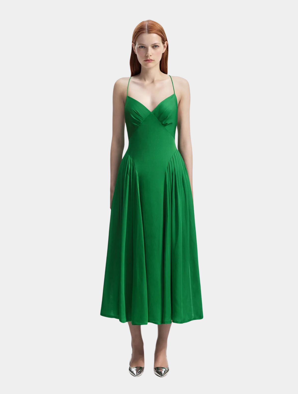 Green V neck midi dress with gathering at hips and spaghetti straps the tighten at the back with a corset style bodice.