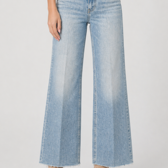 blue jeans on model on plain background