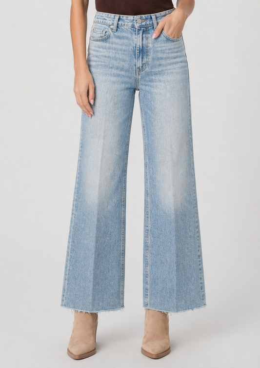 blue jeans on model on plain background