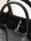 Hand woven black tote bag with leather handles