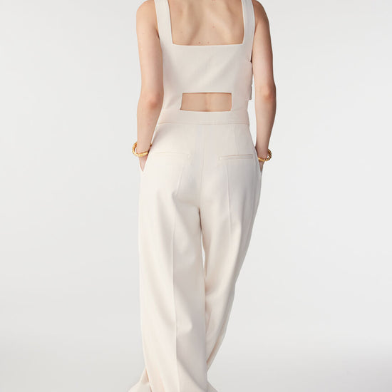 White jumpsuit with button sides 