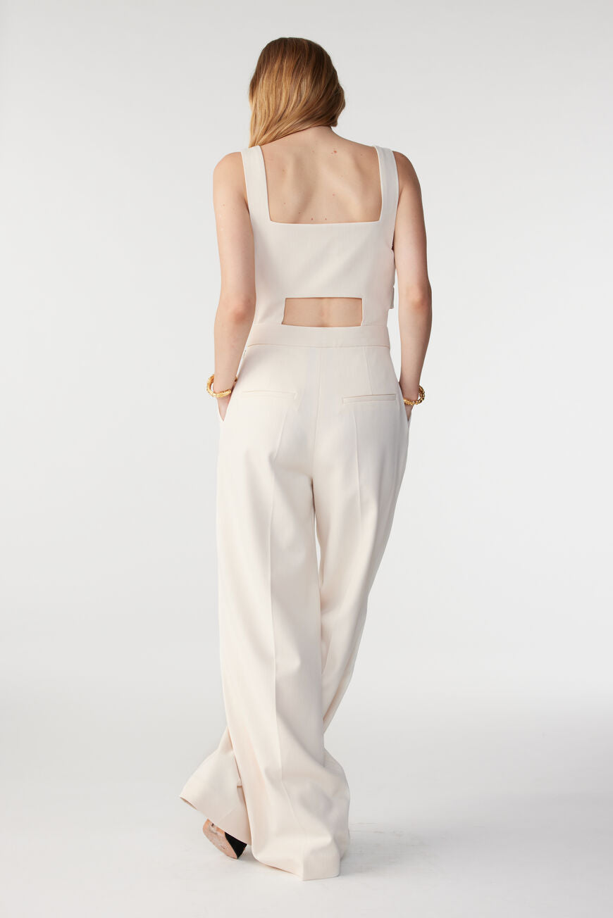 White jumpsuit with button sides 